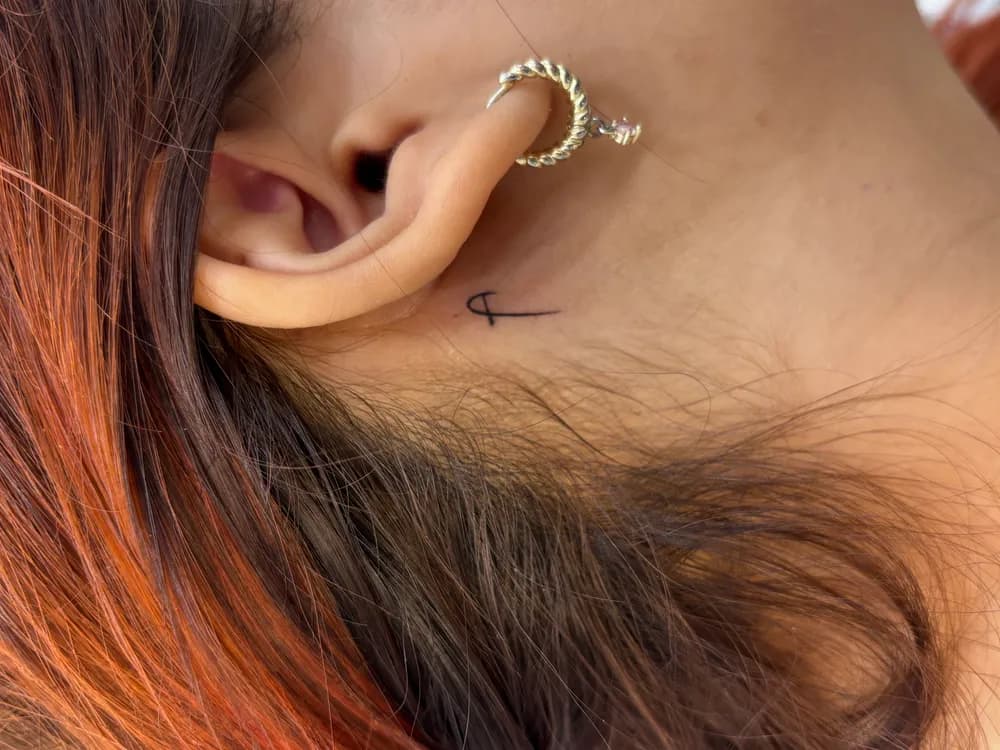 Minimalist Script Calligraphy Tattoo